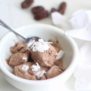 A bowl of chocolate ice cream sweetened with dates.