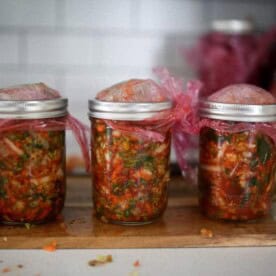 Three jars of homemade kimchi.