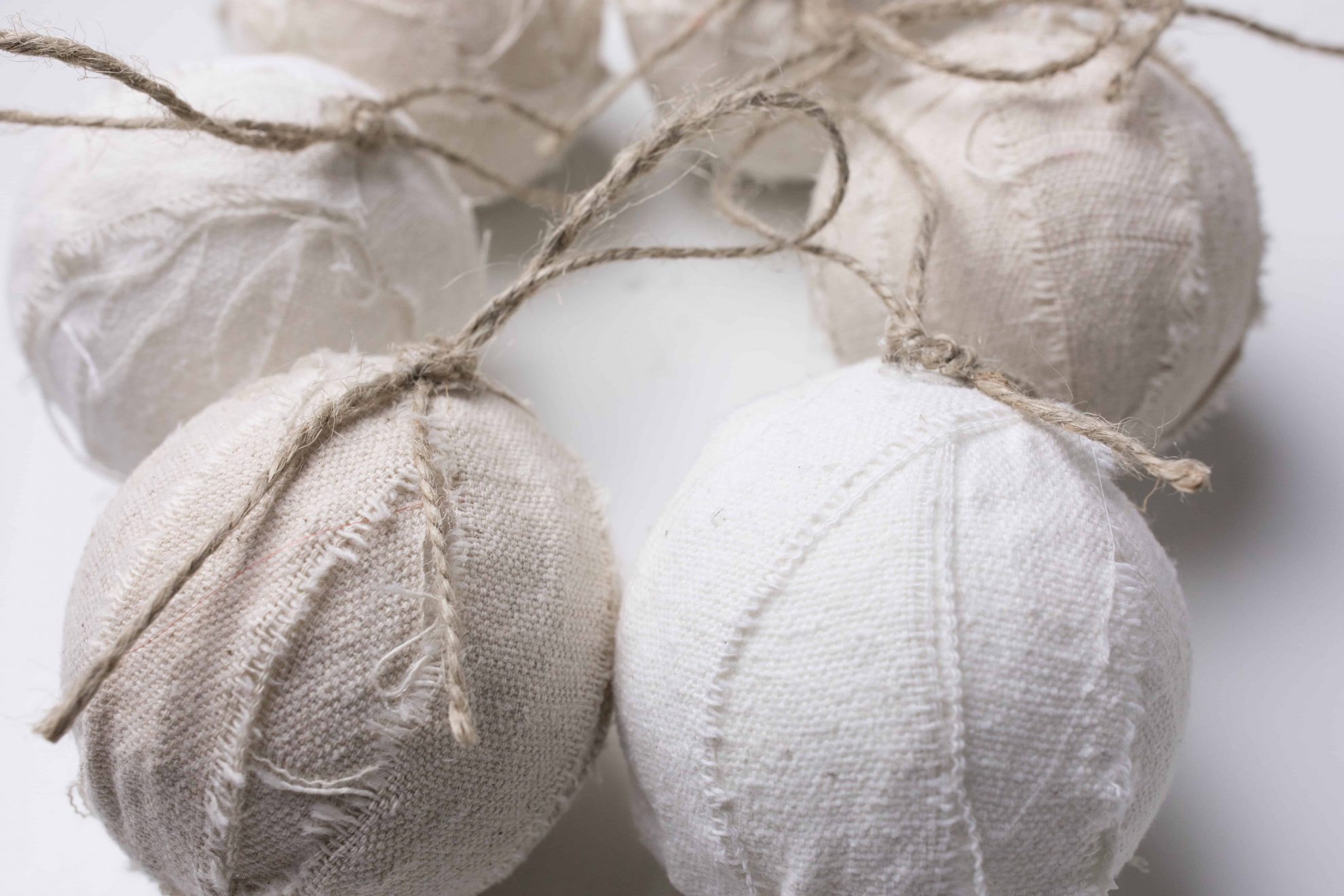 Homemade Christmas Ornaments made with drop cloth and styrofoam craft balls. Super simple tutorial includes video 