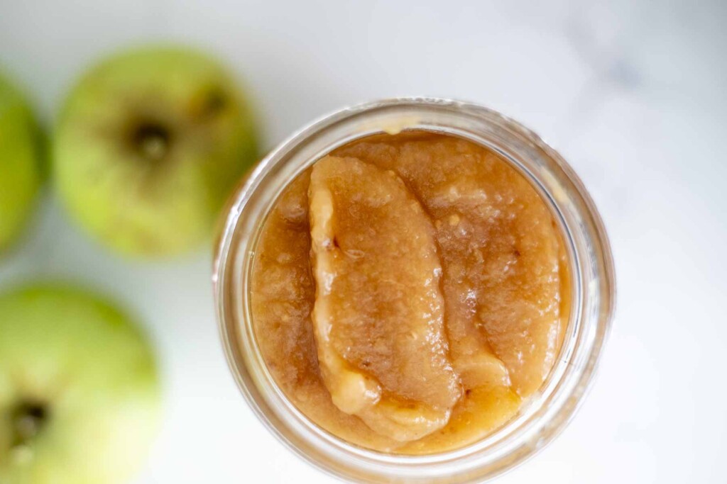 Applesauce in a mason jar.