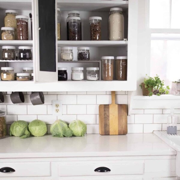 Farmhouse Kitchen Cabinet Organization with Mason Jars