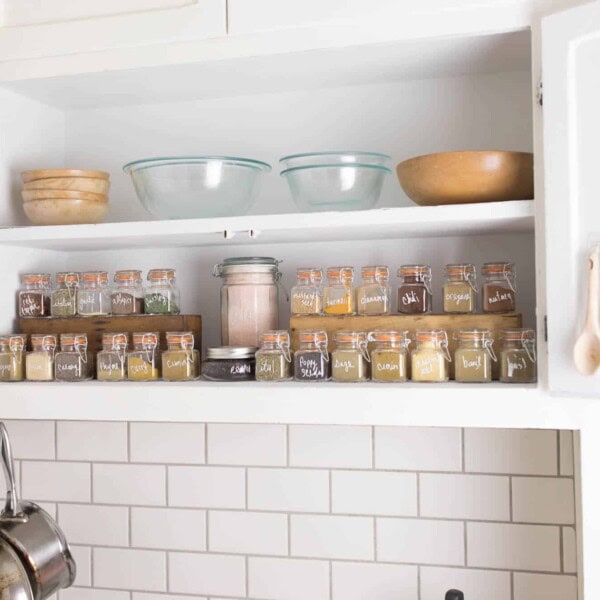 spice cabinet organization with glass spice jars