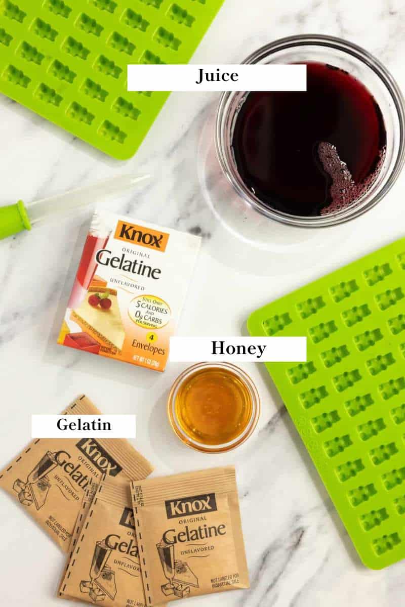 gelatin, honey, and juice on a countertop.