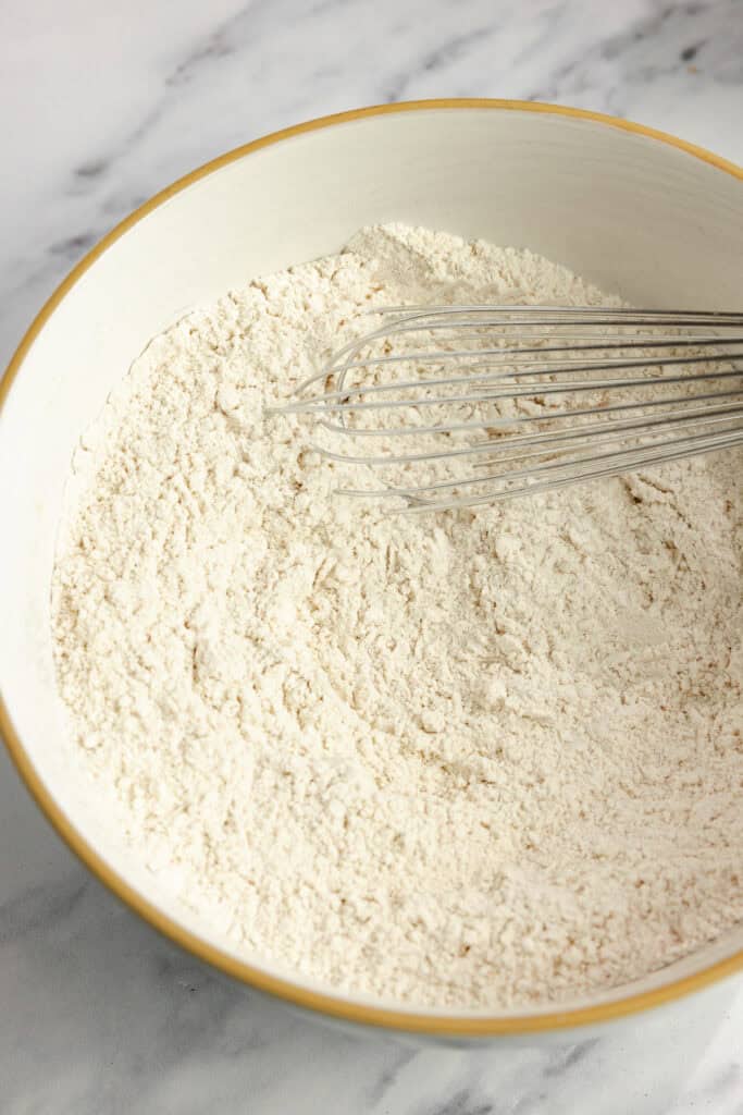 Dry ingredients whisked together in a bowl.