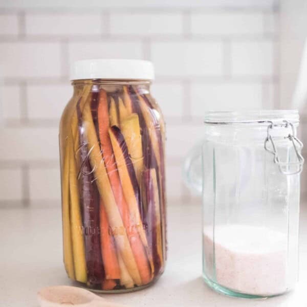 Fermented carrots in mason jar.