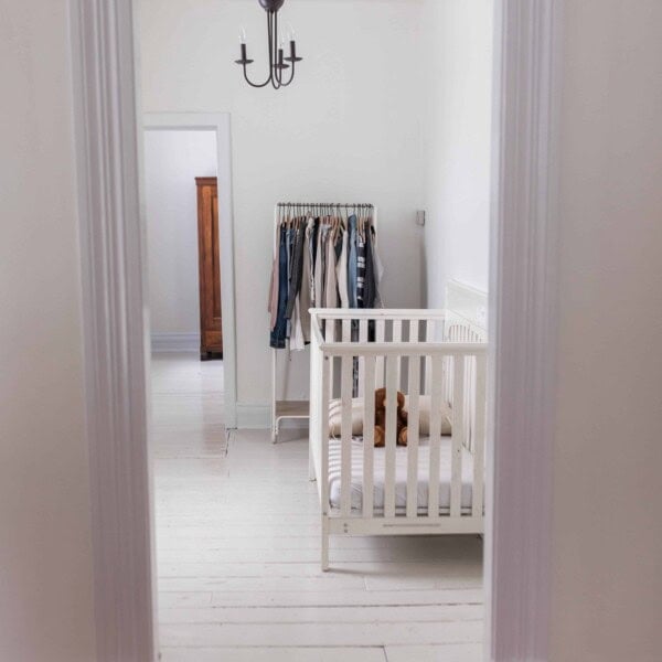 painted white hardwood floors in farmhouse nursery