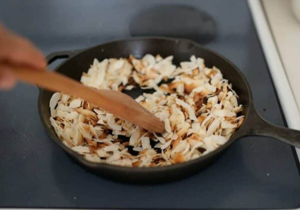 toasting coconut in a cast iron skillet.