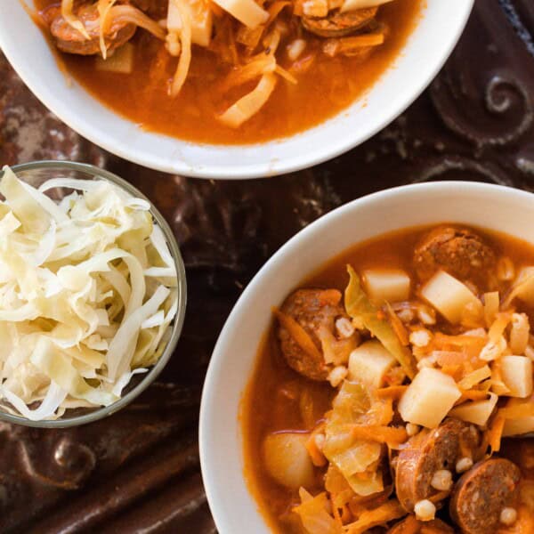 two bowls of sausage sauerkraut soup