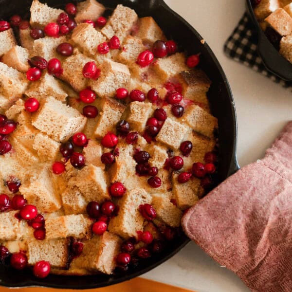 cranberry French toast casserole in a cast iron skillet