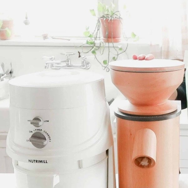 nutrimill and mockmill mills on a white countertop