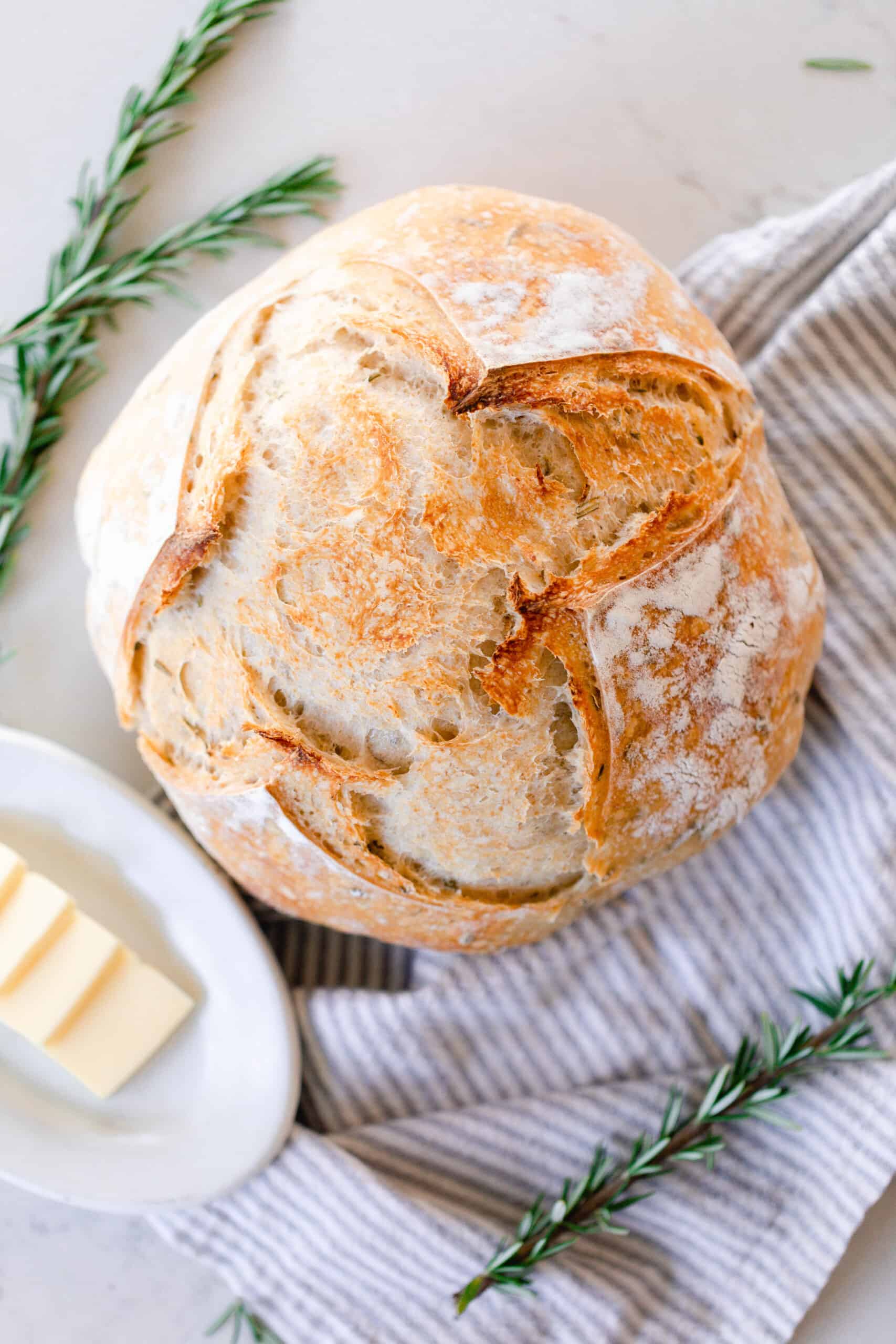 https://www.farmhouseonboone.com/wp-content/uploads/2022/12/rosemary-sourdough-bread-11-scaled.jpg