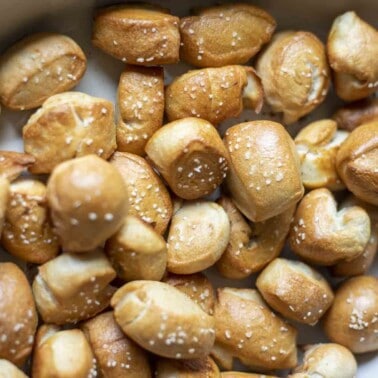 overhead photo of sourdough pretzel bites in a enameled cast iron dish