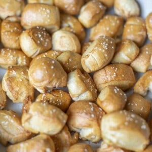 sourdough pretzel bites layered in a cast iron enameled pan