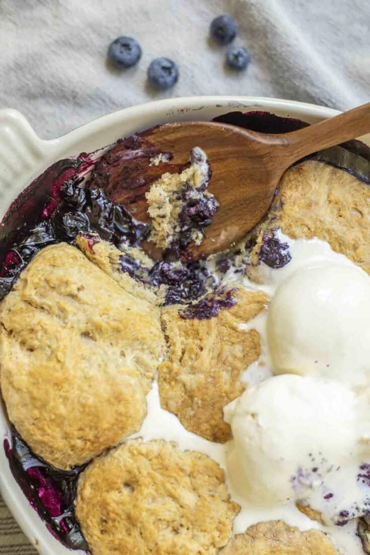 https://www.farmhouseonboone.com/wp-content/uploads/2023/08/sourdough-blueberry-cobbler-735x1103.jpg