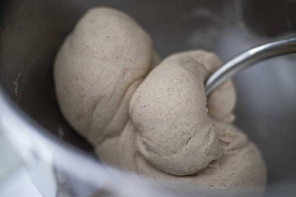 cinnamon bagel dough in the stand mixer.