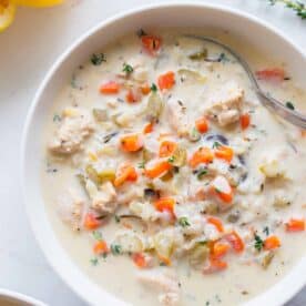 A large bowl full of chicken and wild rice soup.