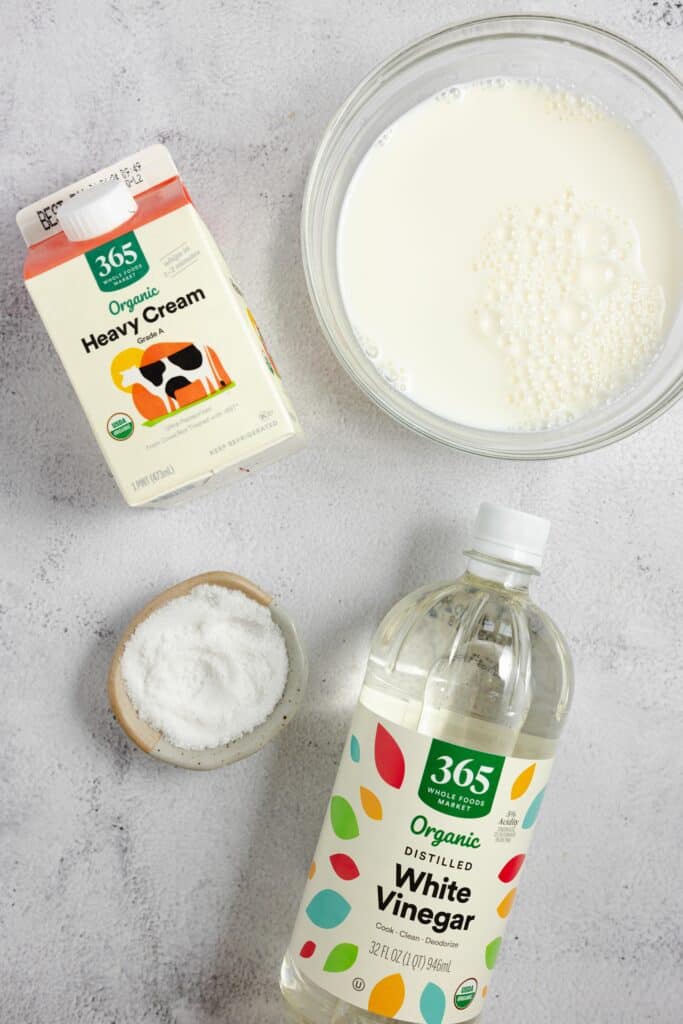 milk, cream, salt and vinegar on a countertop