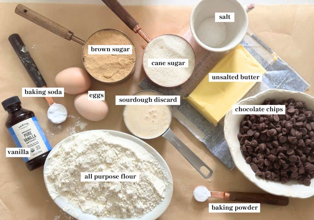 sourdough chocolate chip cookie ingredients spread out on a countertop