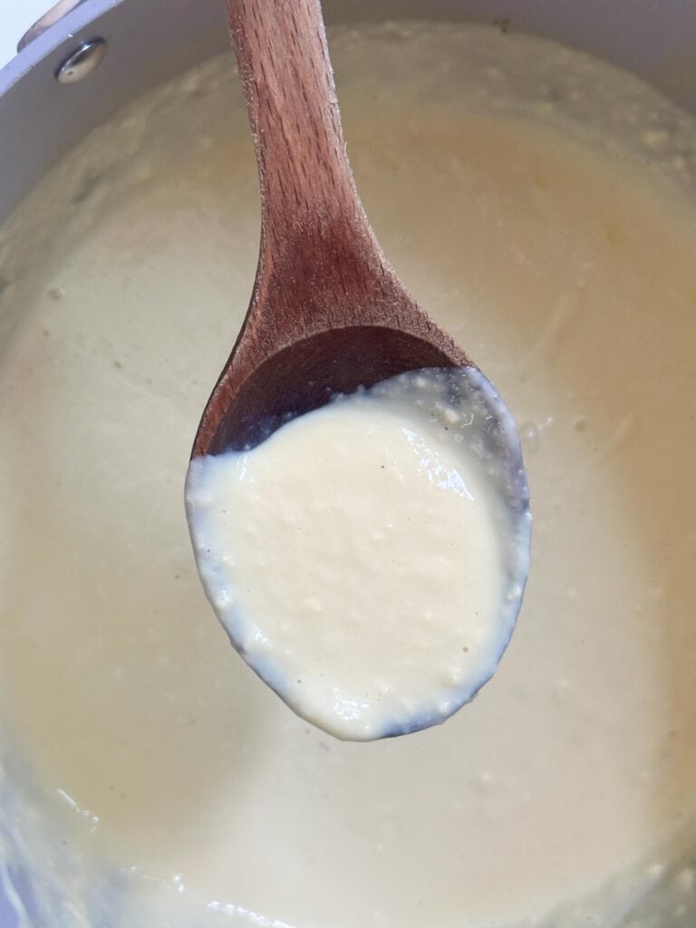 thickened custard on a spoon.