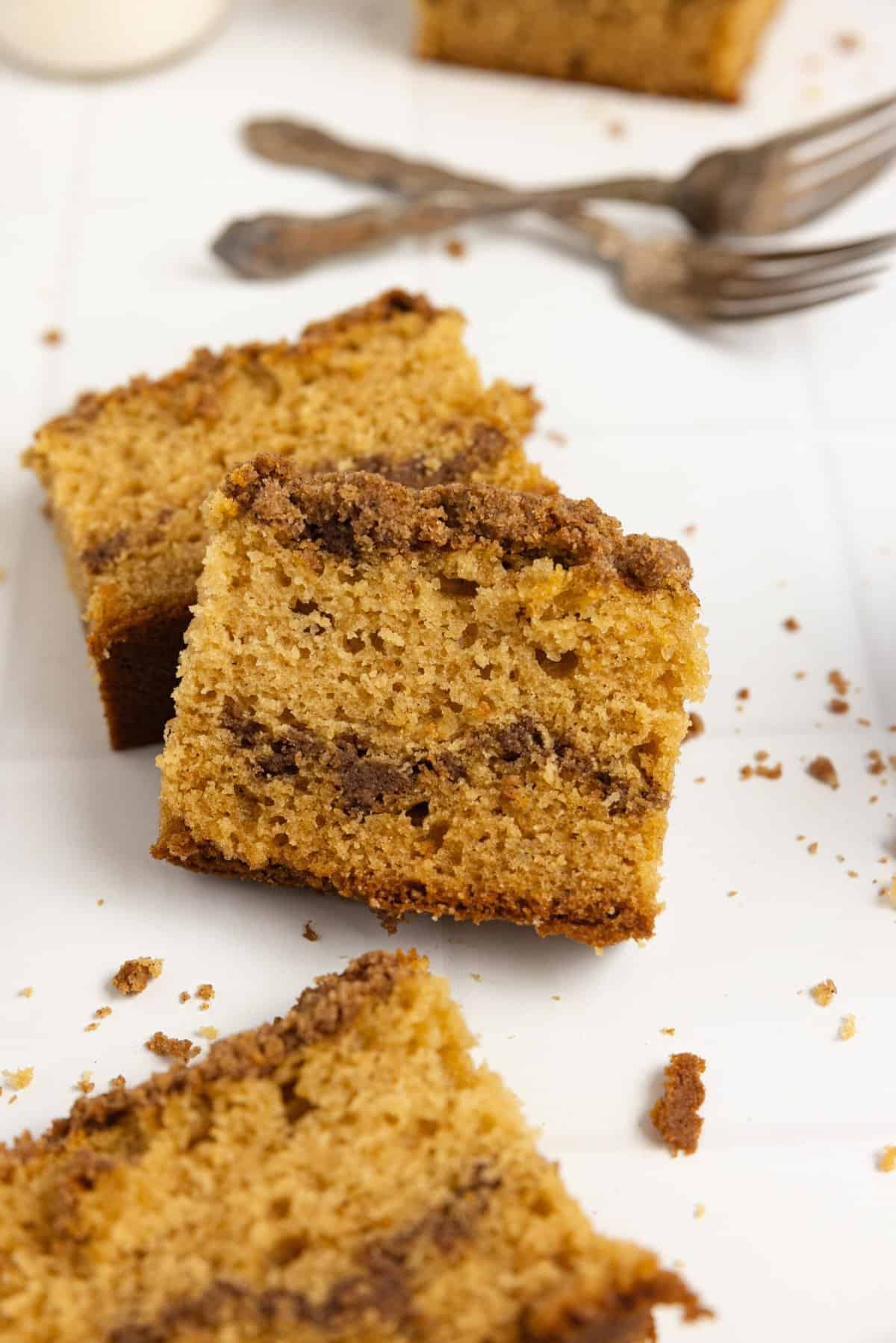 sourdough coffee cake slices on a white countertop.