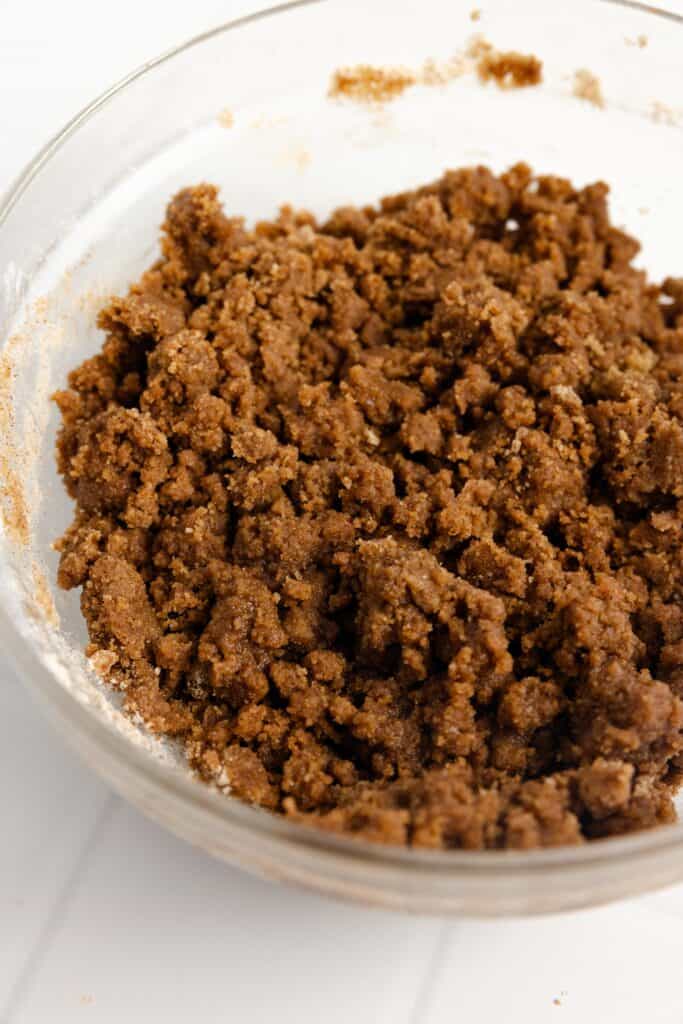 brown sugar, cinnamon, melted butter and flour in a glass bowl.