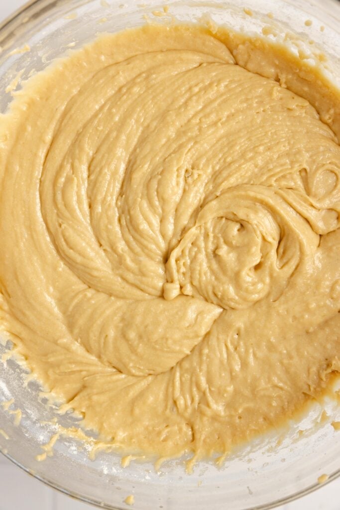 sourdough coffee cake batter in a glass bowl.