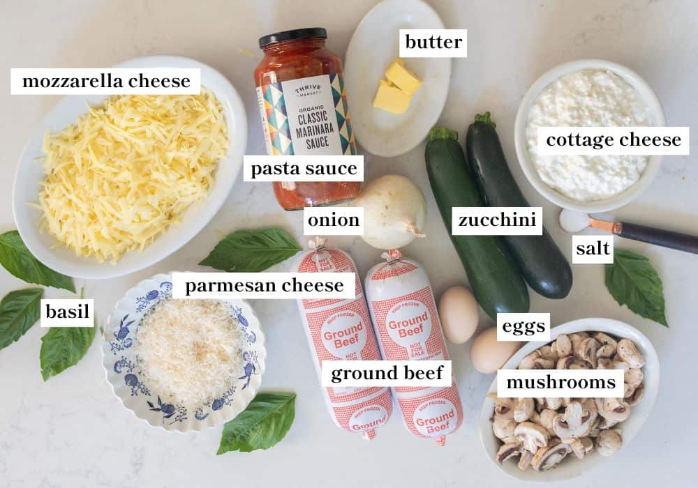 zucchini lasagna ingredients spread out on a countertop.