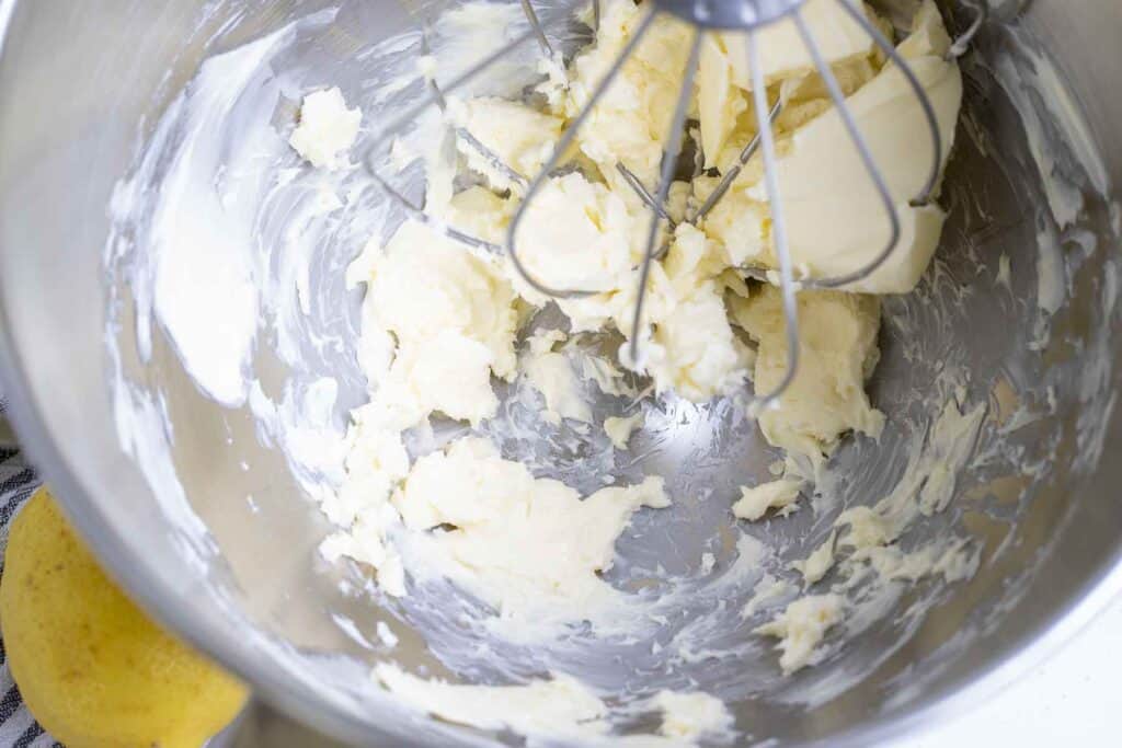 butter in a stand mixer with a whisk attachment.