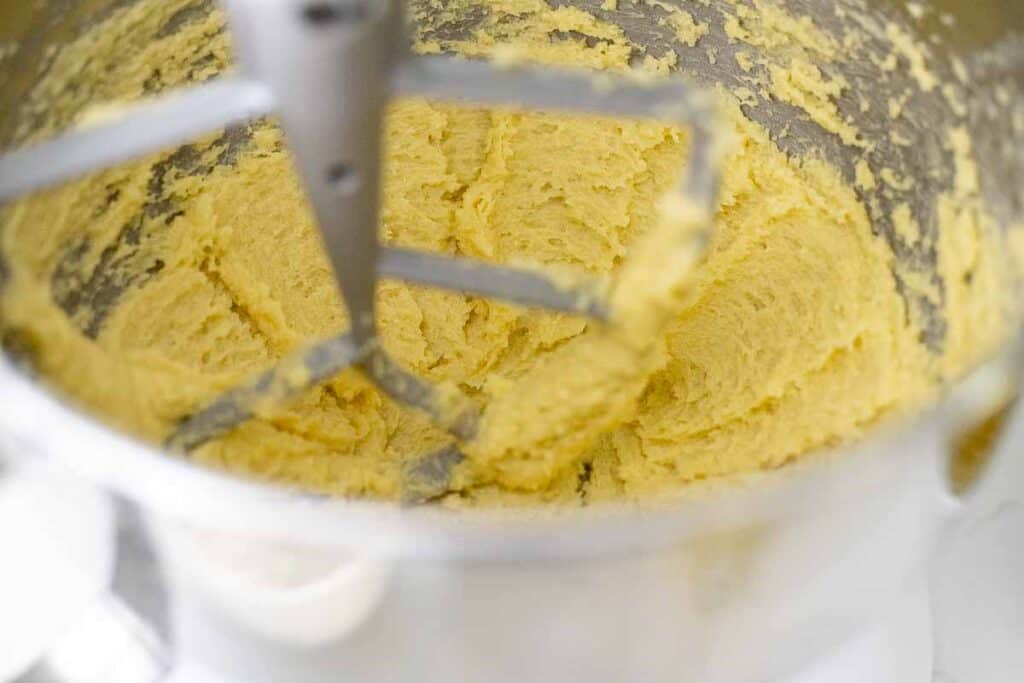 creaming butter and sugar together in a stand mixer bowl.