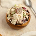 Grape chicken salad in a wooden bowl.