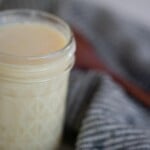 A jar of homemade sweetened condensed milk.