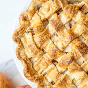 Overhead photo of a half of homemade apple pie.