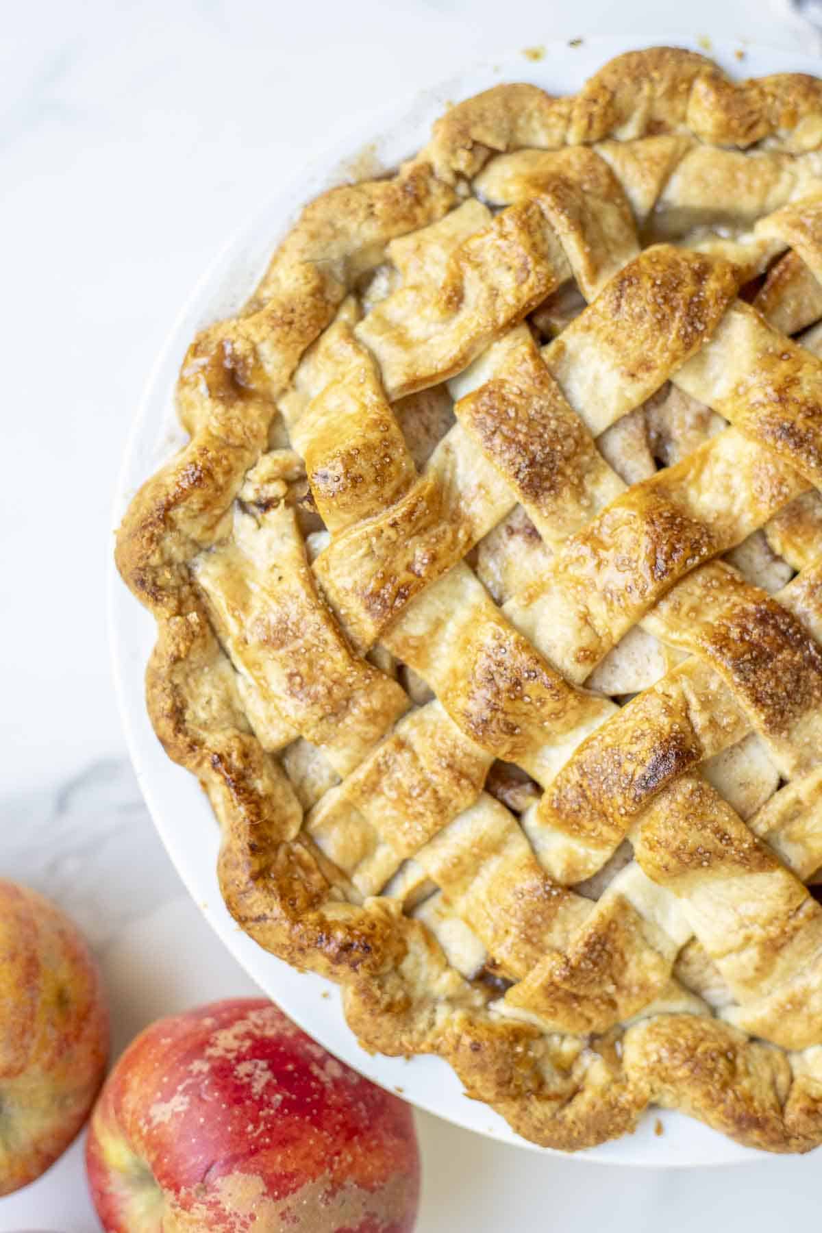 Overhead photo of a half of homemade apple pie.