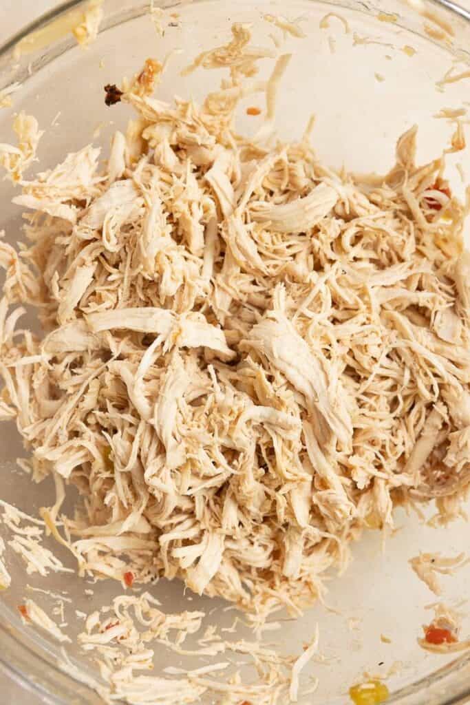 Shredded chicken in a bowl.