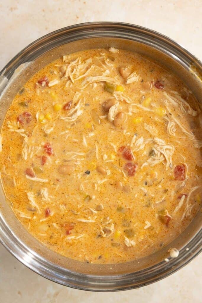 A large stock pot full of white chicken chili.