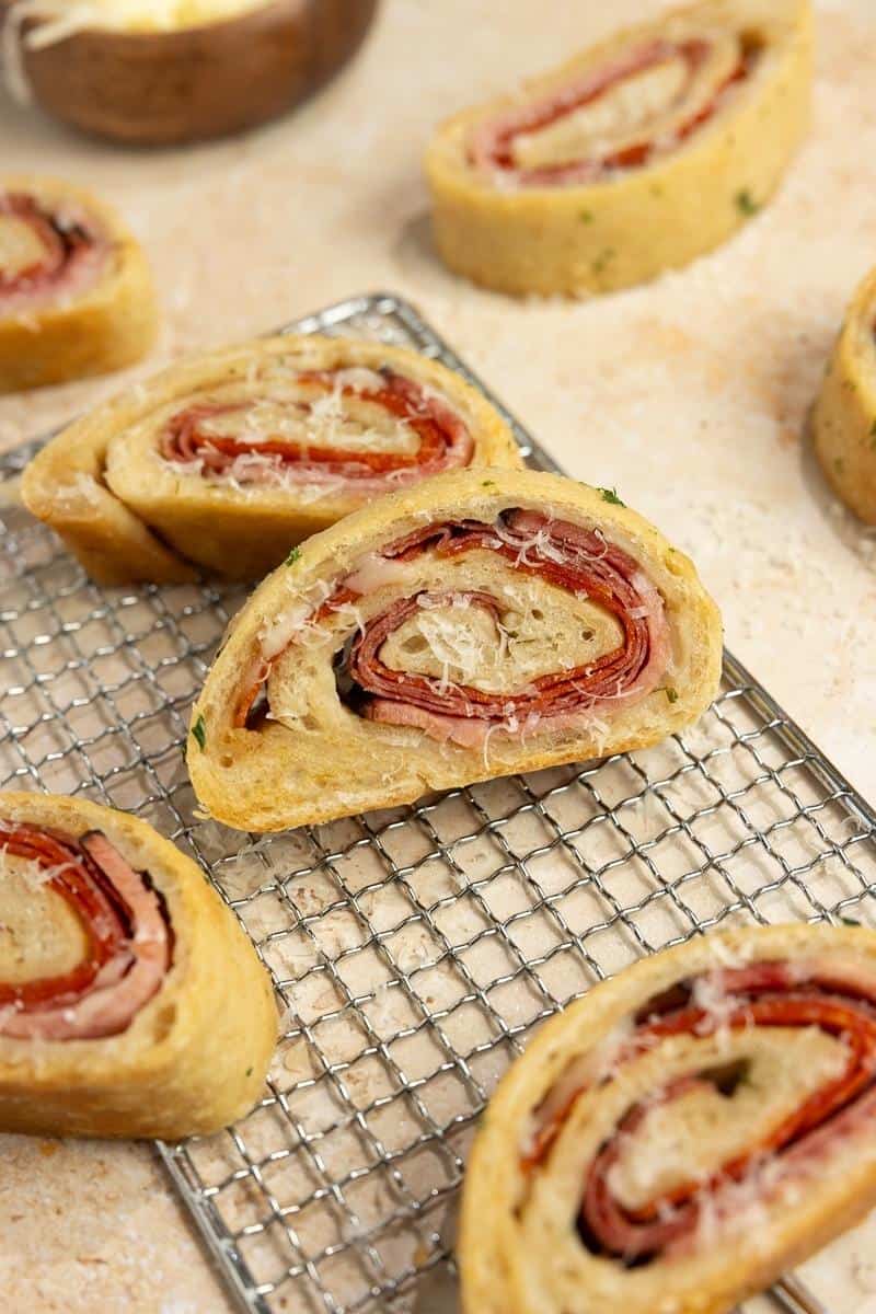 Slices of Sourdough Stromboli on a wire rack.