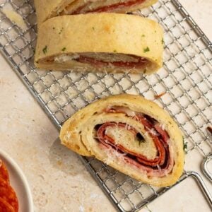 slices of Sourdough Stromboli on a wire rack.