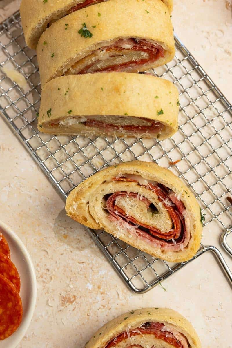 slices of Sourdough Stromboli on a wire rack.