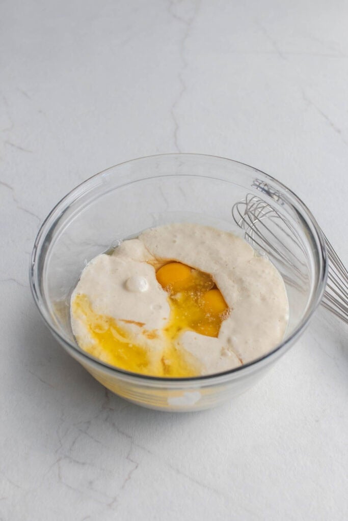 Sourdough apple cobbler topping ingredients in a small glass bowl.