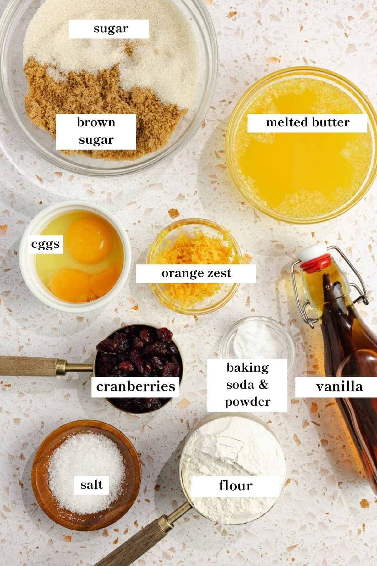 Ingredients for cranberry cookies on a countertop.