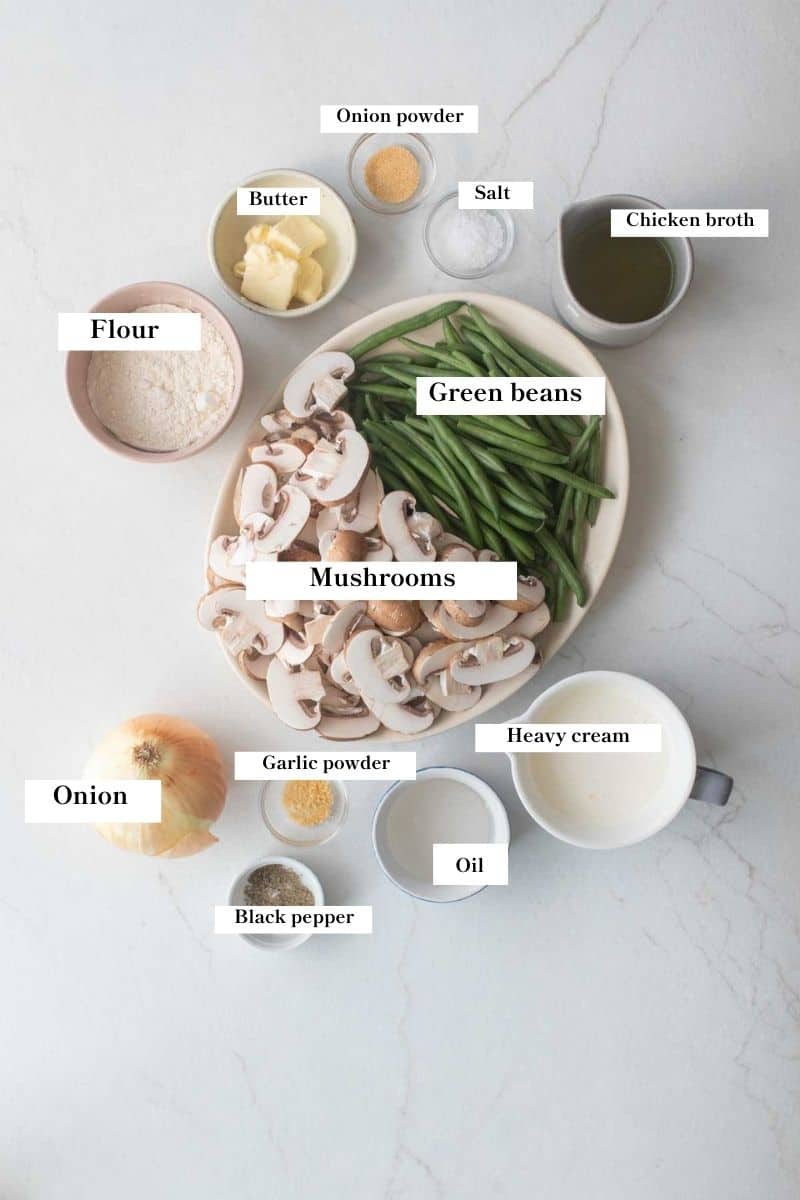 The ingredients for green bean casserole laid out on a countertop. 