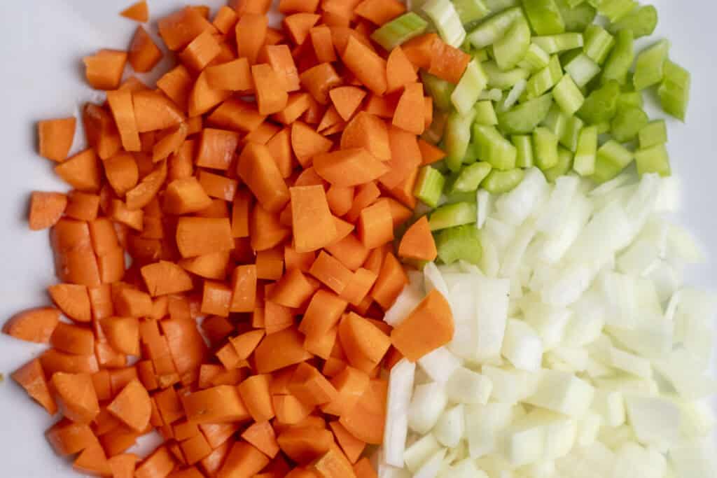 Carrots, celery, and onion diced up.