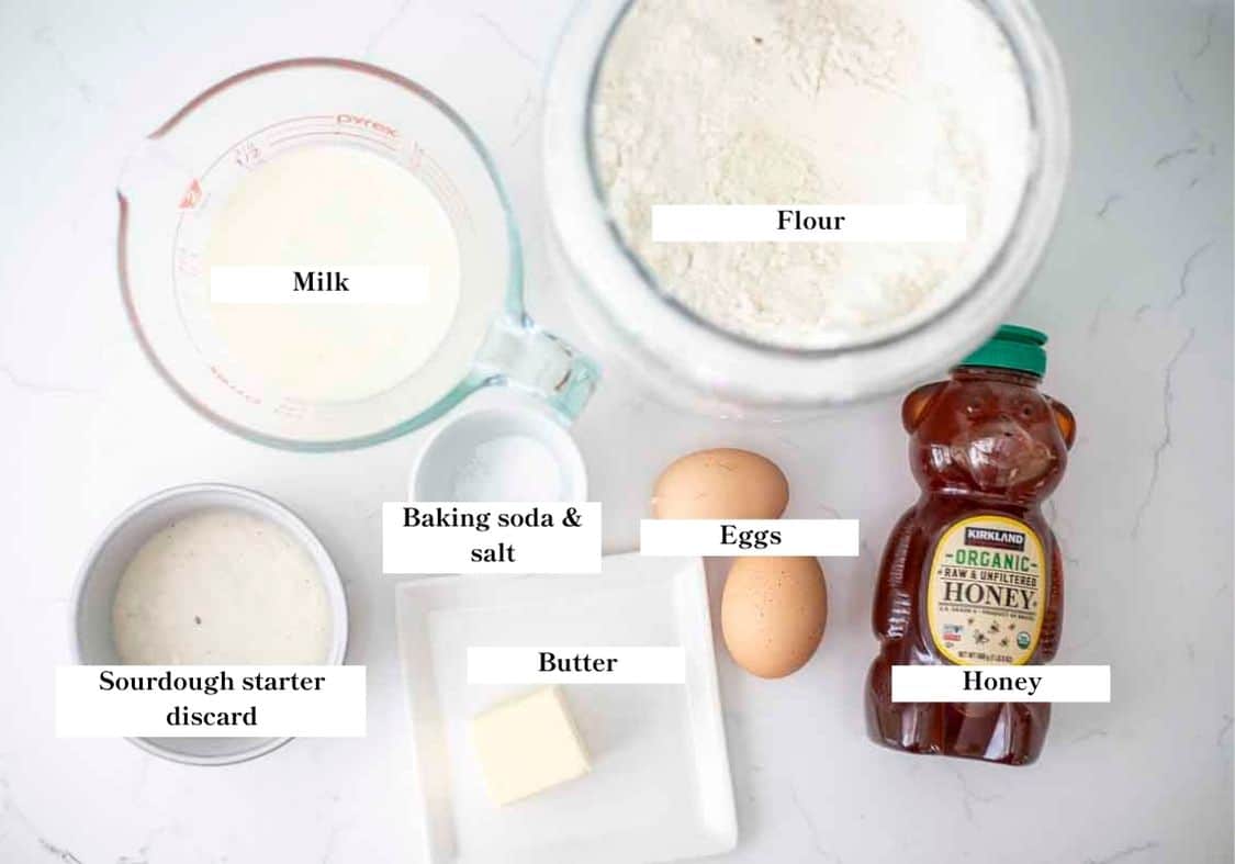 Ingredients for sourdough discard pancakes laid out on a countertop. 