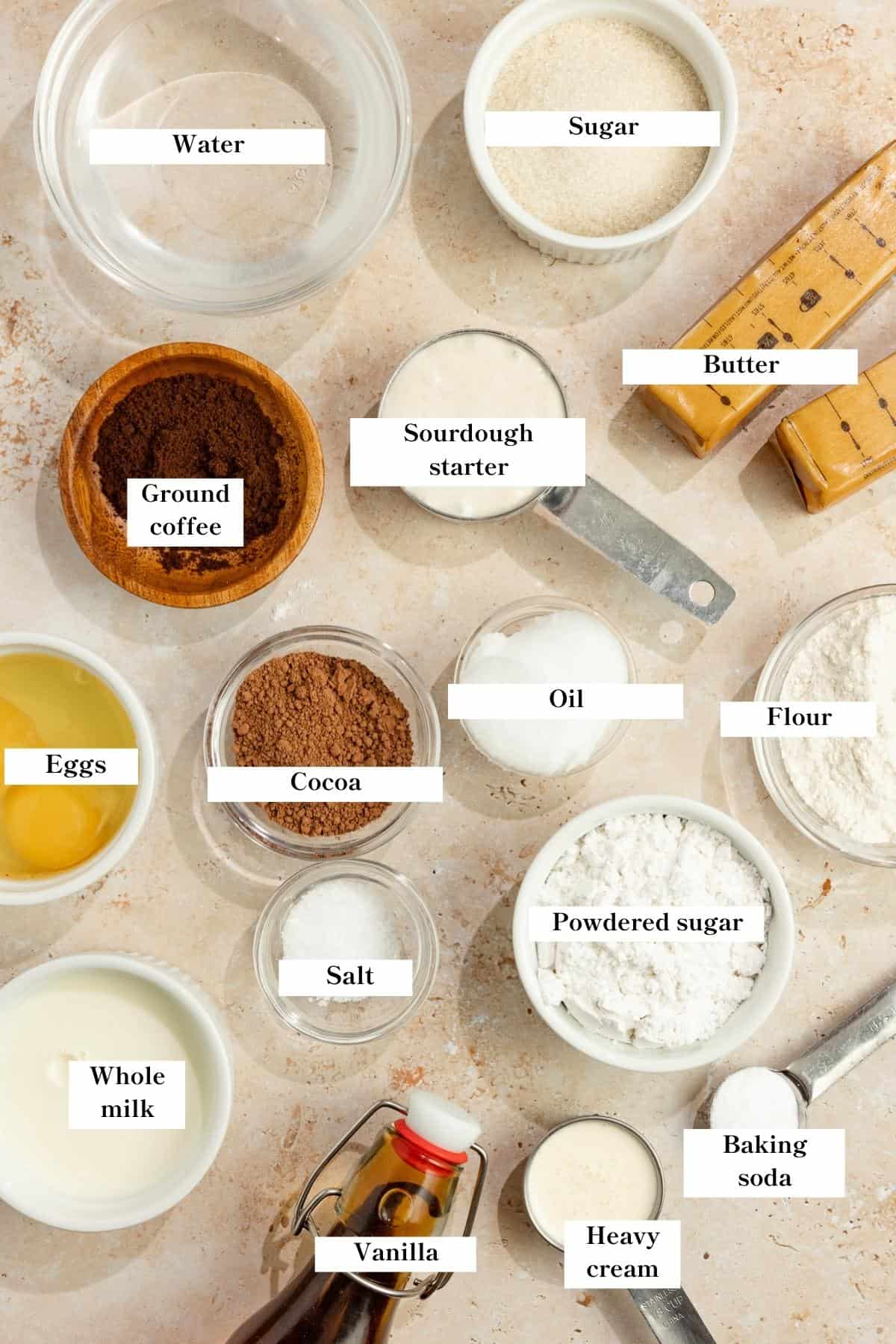 Ingredients for chocolate cake laid out on the counter.