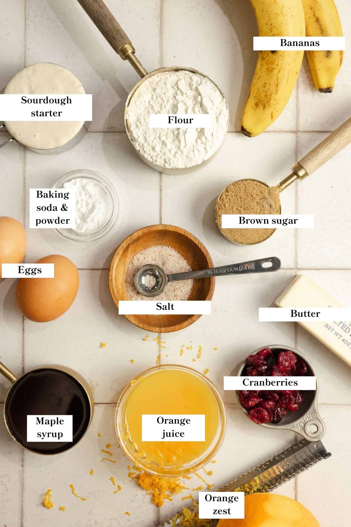 Ingredients for banana cranberry bread on the counter top. 