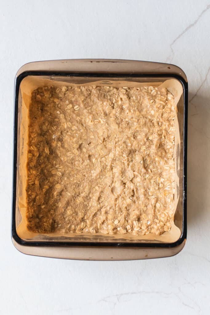 The bottom crust flattened into a square baking pan.