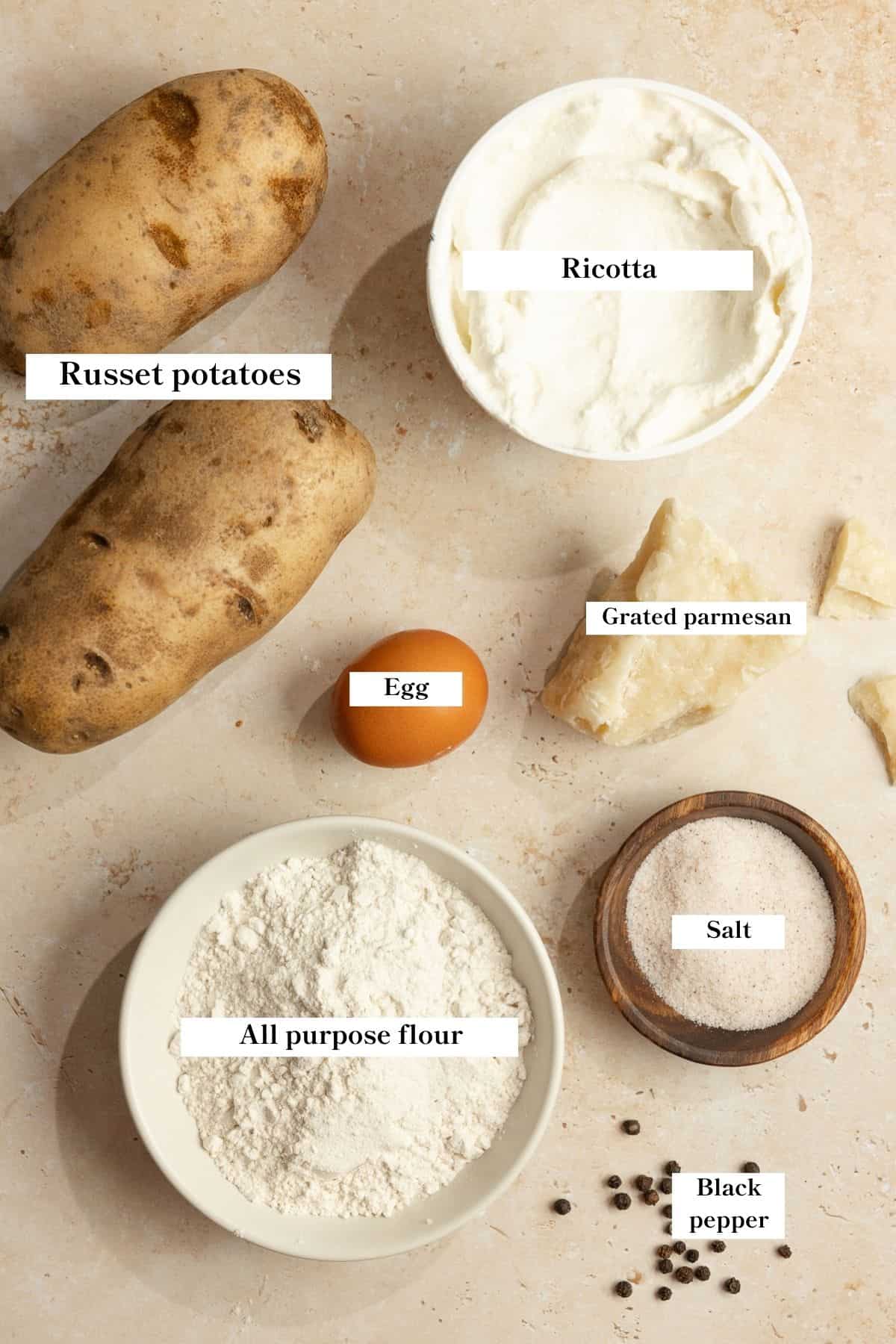 Ingredients for gnocchi on the counter top. 