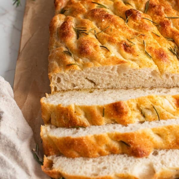 A loaf of focaccia sliced.