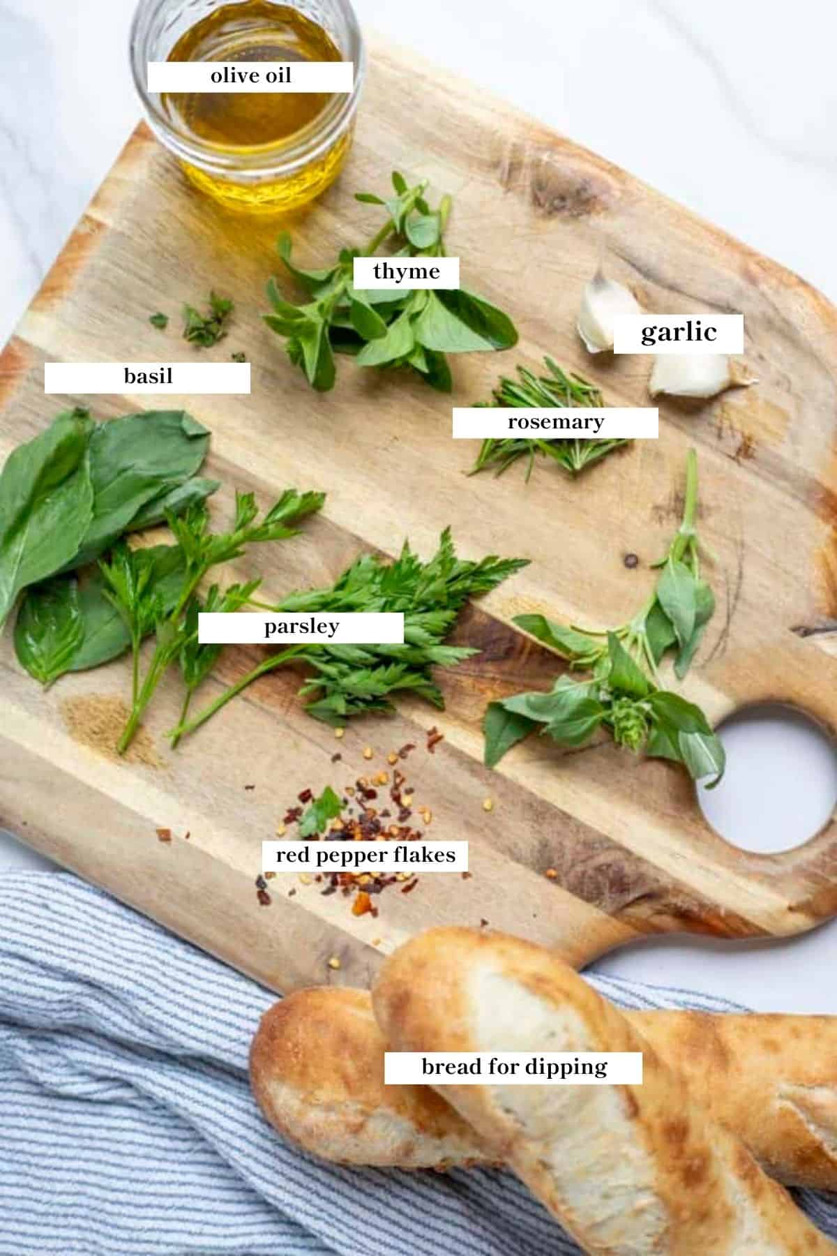 Ingredients and herbs on a cutting board. 