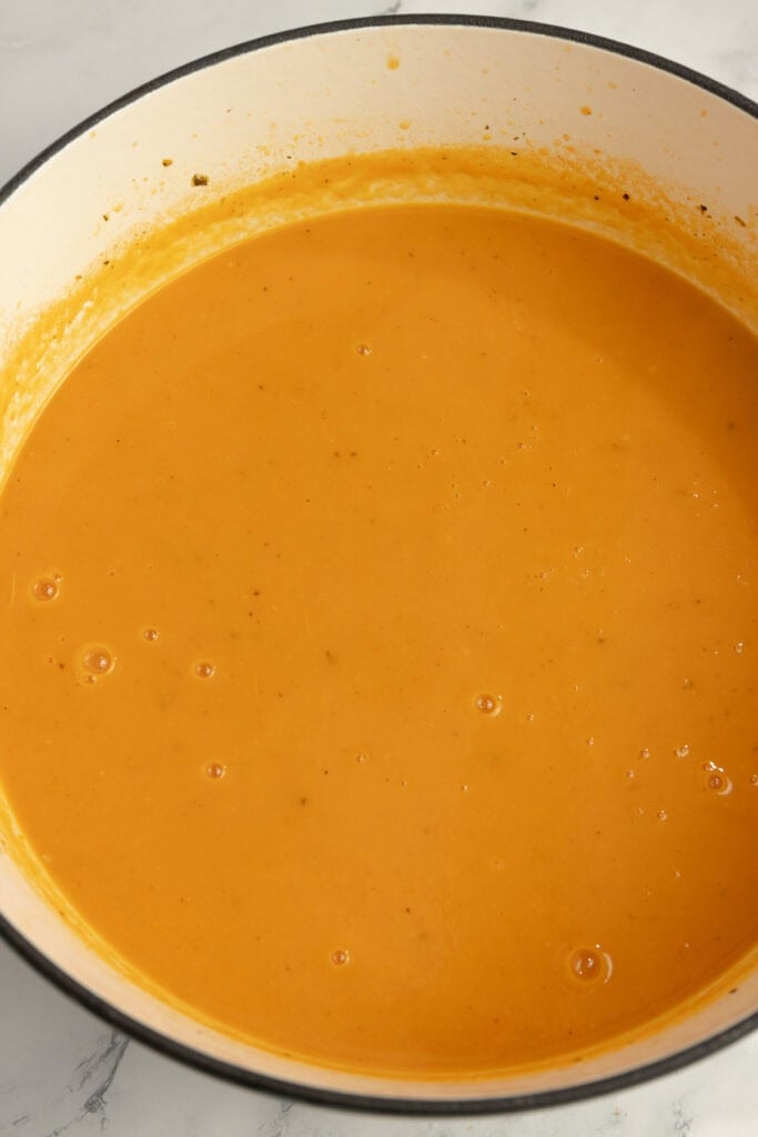 Tomato soup blended in a dutch oven. 